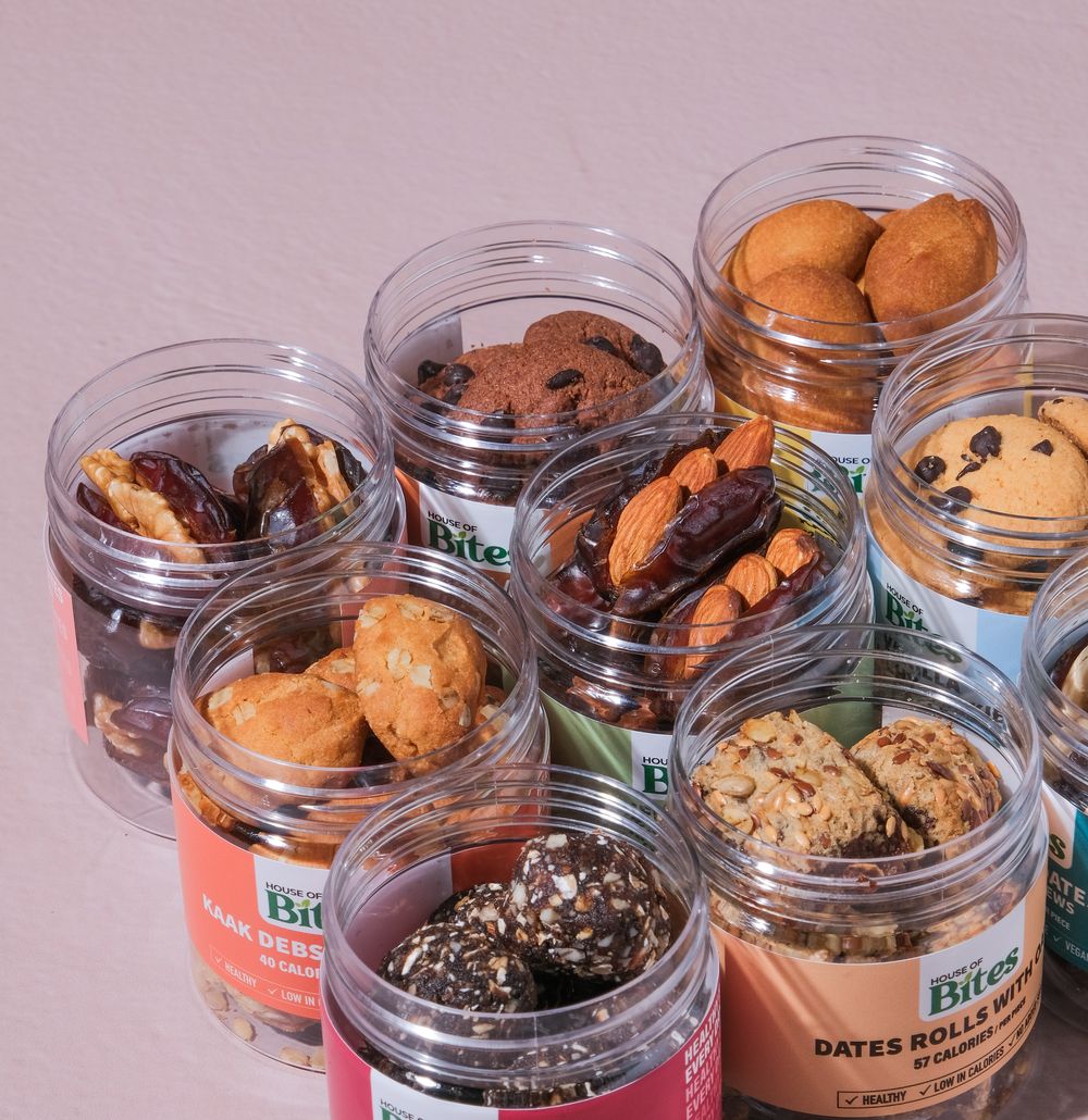 Open House of Bites jars filled with cookies, stuffed dates, energy balls and dates rolls.
